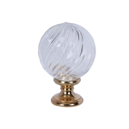 Boule de départ de rampe en cristal soufflé à côtes torses obliques sur embase en laiton poli.